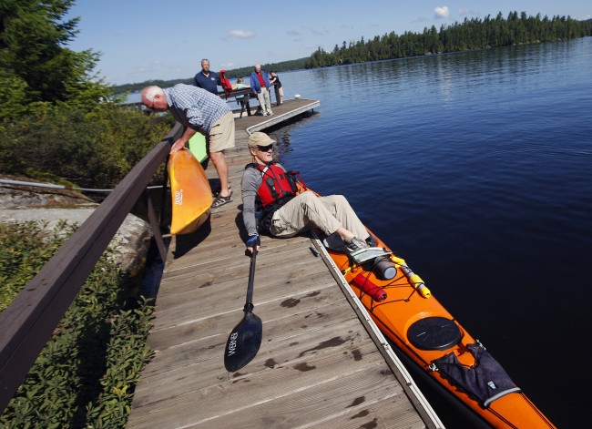 Some who attend Island Chapel transport themselves to and from Chapel Island for the service in their own craft, 2014.