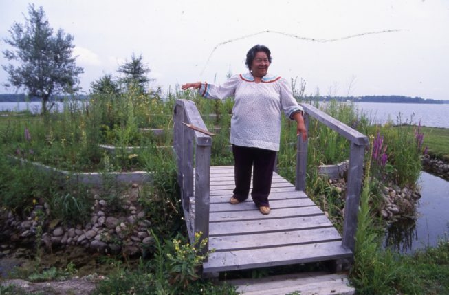 Cecilia Kaienes Mitchell in her medicine wheel garden.