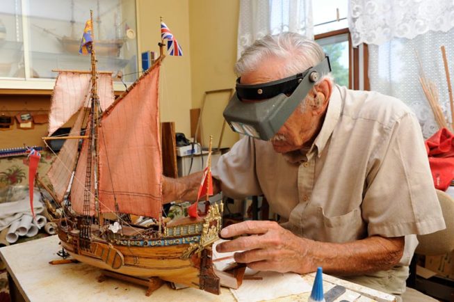 Model wooden boat builder Frank White at work, 2012.