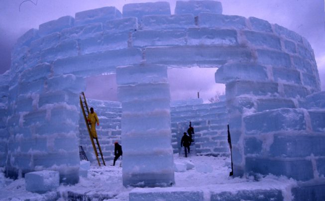 The Winter Carnival Ice Palace under construction, 1997. Over the years, palaces have been built with 1,000 to 4,000 ice blocks (generally 2'x4'), with parts rising up to 60 feet tall, weather and ice allowing.