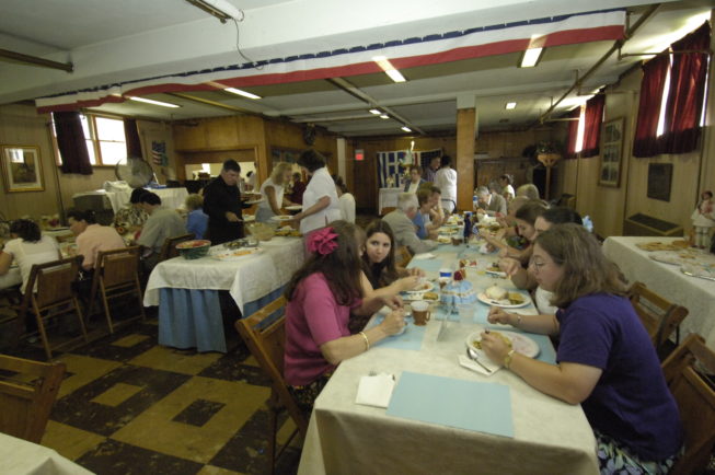 The community enjoys the meal and celebration on the day of the St. Vasilios Greek Orthodox Church Pastry Sale and Dinner.
