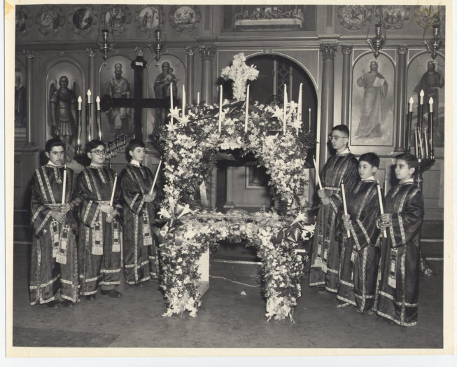 An earlier service at the St. Vasilios Greek Orthodox Church. Date and photographer unknown.