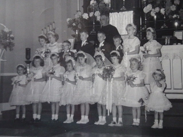 Loretta’s First Communion (Loretta 4th from left, front row) at St. Hedwig’s Catholic Church (Houseville, NY), c. 1958. Photographer unknown. Courtesy of Loretta Lepkowski.