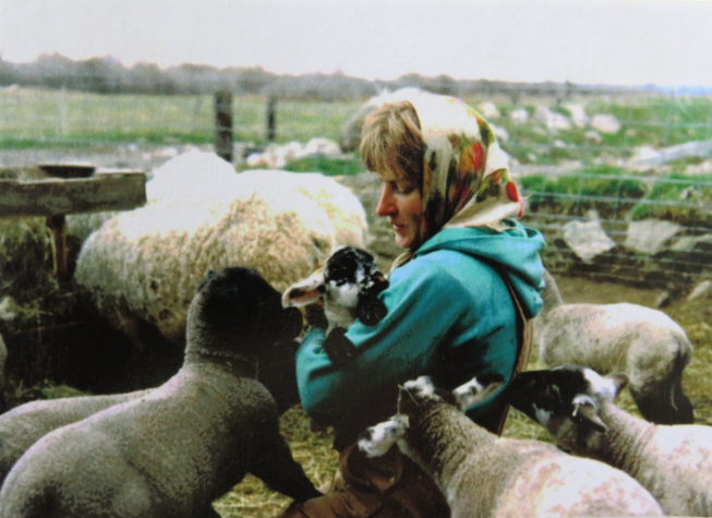 This photo of Loretta’s youngest sister Janet with her lambs was Loretta’s reference for the “Shepherdess” painting in her Family Farm portrait series project. Photographer unknown, c. 1980s. Courtesy of Loretta Lepkowski.