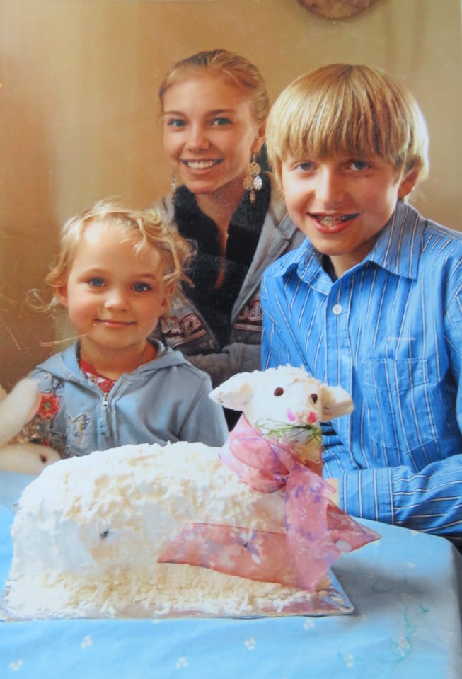 Loretta’s niece, daughter, and son (left to right) with the Easter lamb cake. Loretta and her family continue to carry on many of the cultural traditions she grew up with. Photo by Loretta Lepkowski, c. 2008. Courtesy of Loretta Lepkowski.